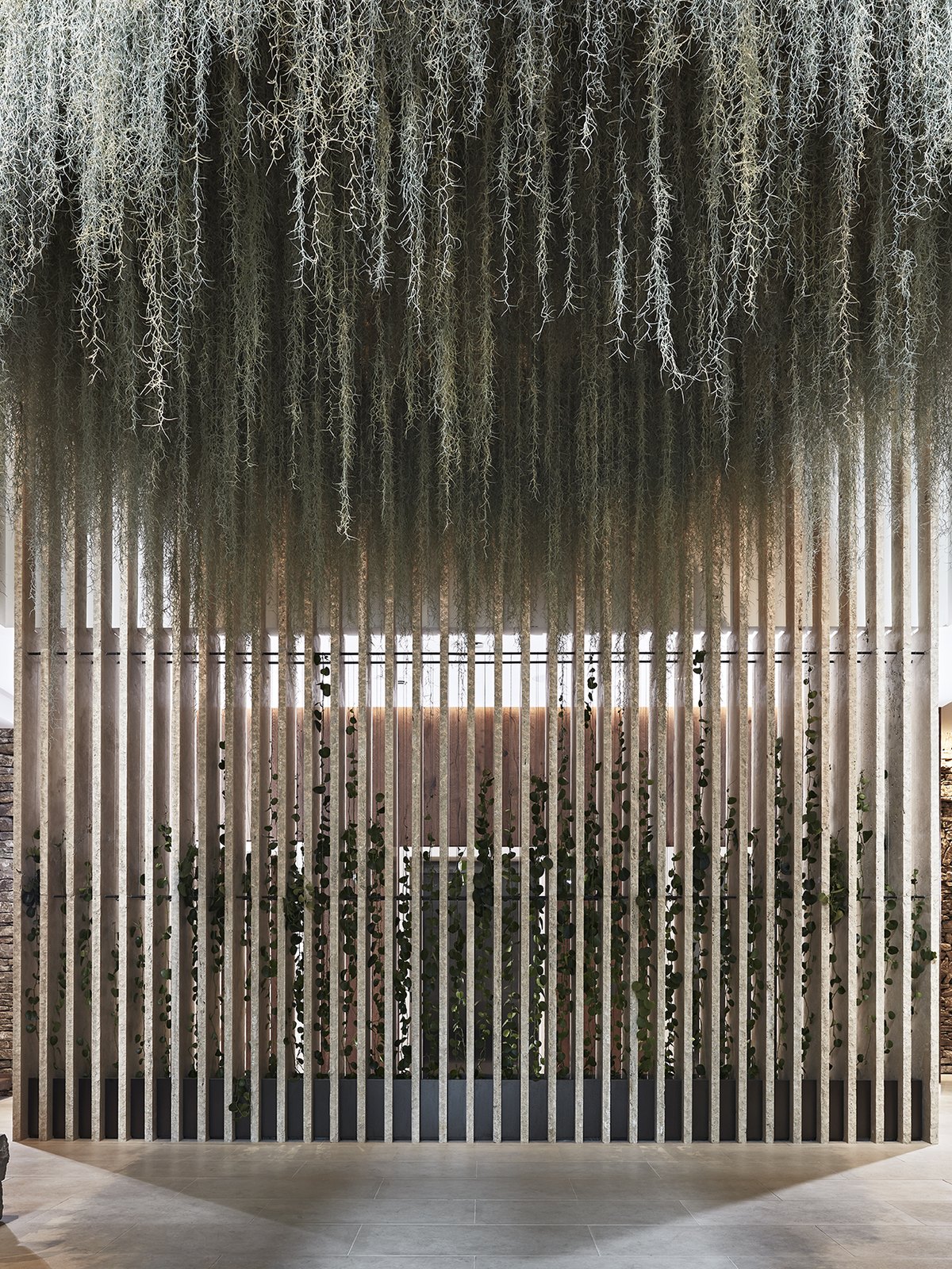 Composed hotel interior with natural materials and soft light